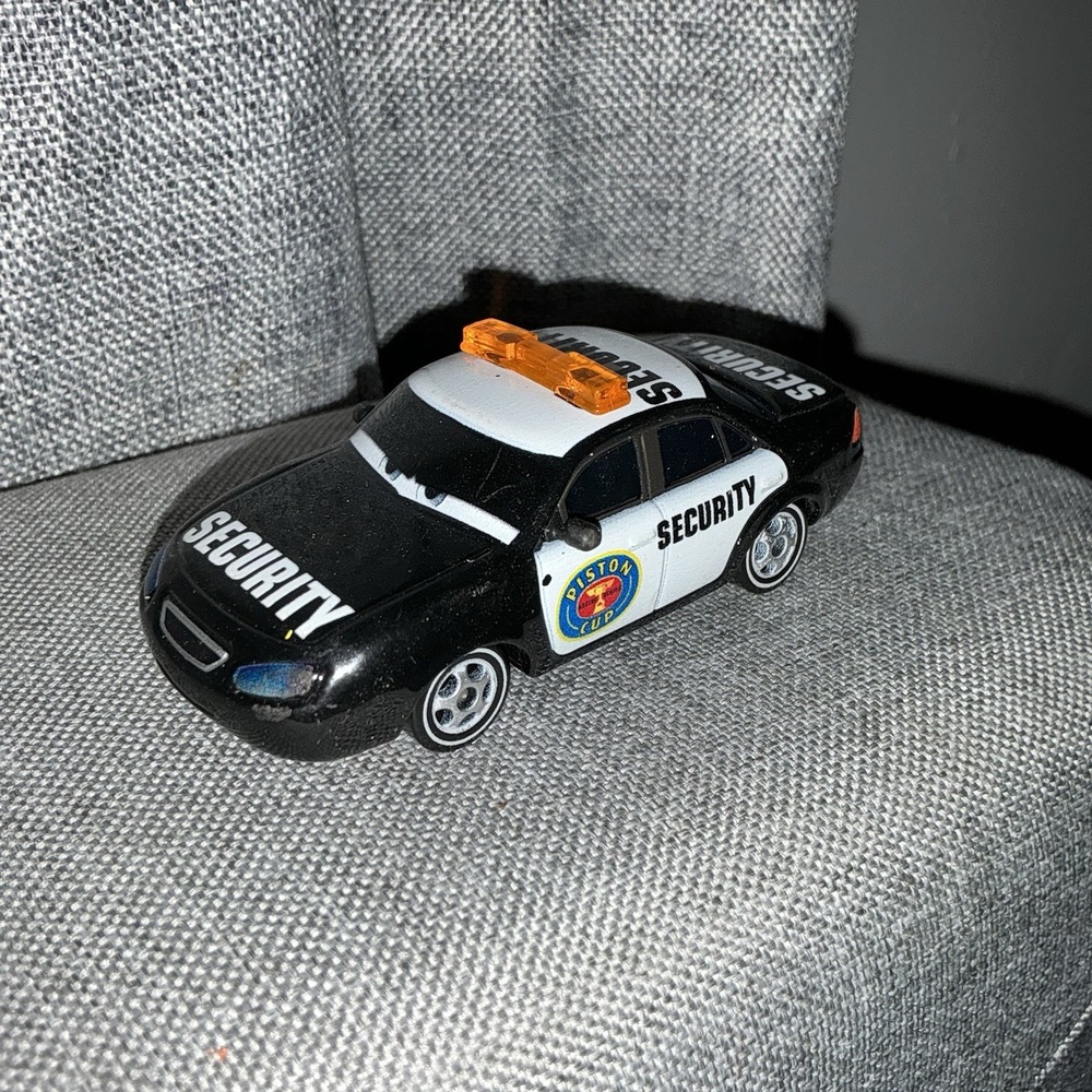 Disney Pixar Cars Piston Cup Security Marlon "Clutches" McKay Diecast HTF / EUC